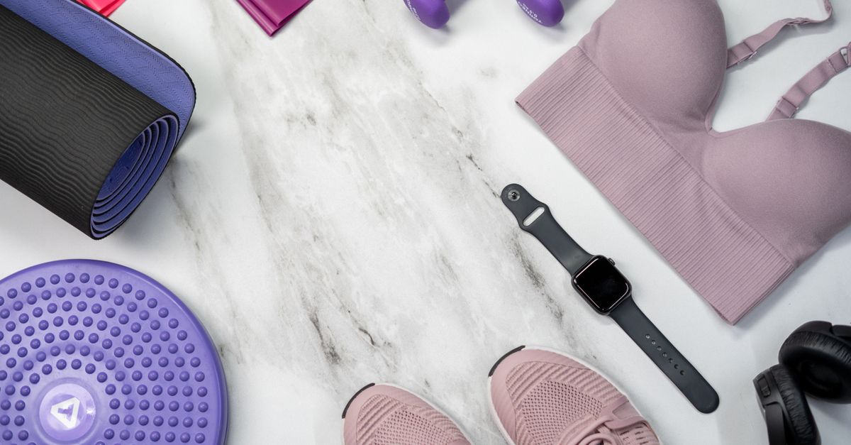 Girls' activewear, leggings and sports bra laid out flat